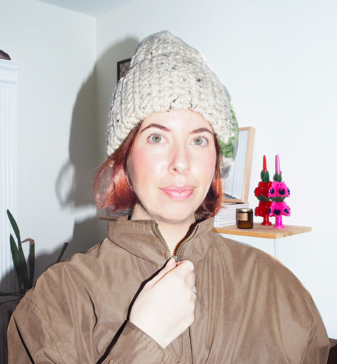 chunky beige hat with green stripe